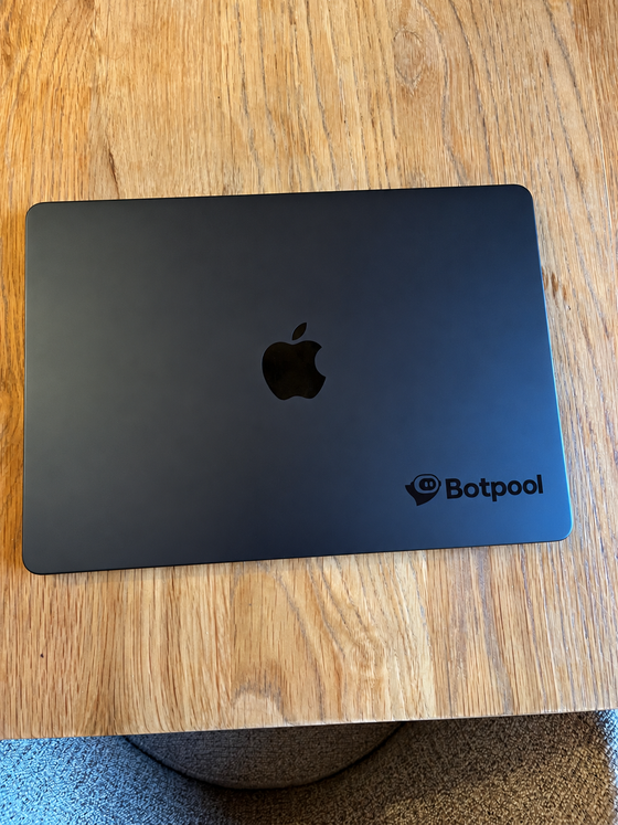The stickers on 11 spots on my Mac, photographed by the seller